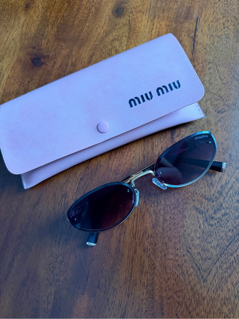 Miu Miu Pink Sunglasses Case with Black-Tinted Oval Sunglasses
